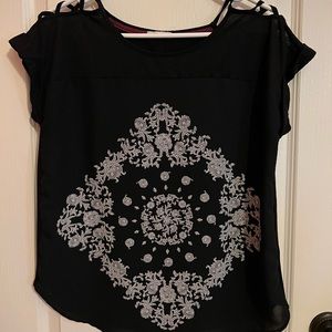 Black and white designed blouse from Maurice’s. Size M